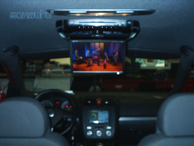 Volkswagen GOLF 5 (pantalla de techo y navegador)